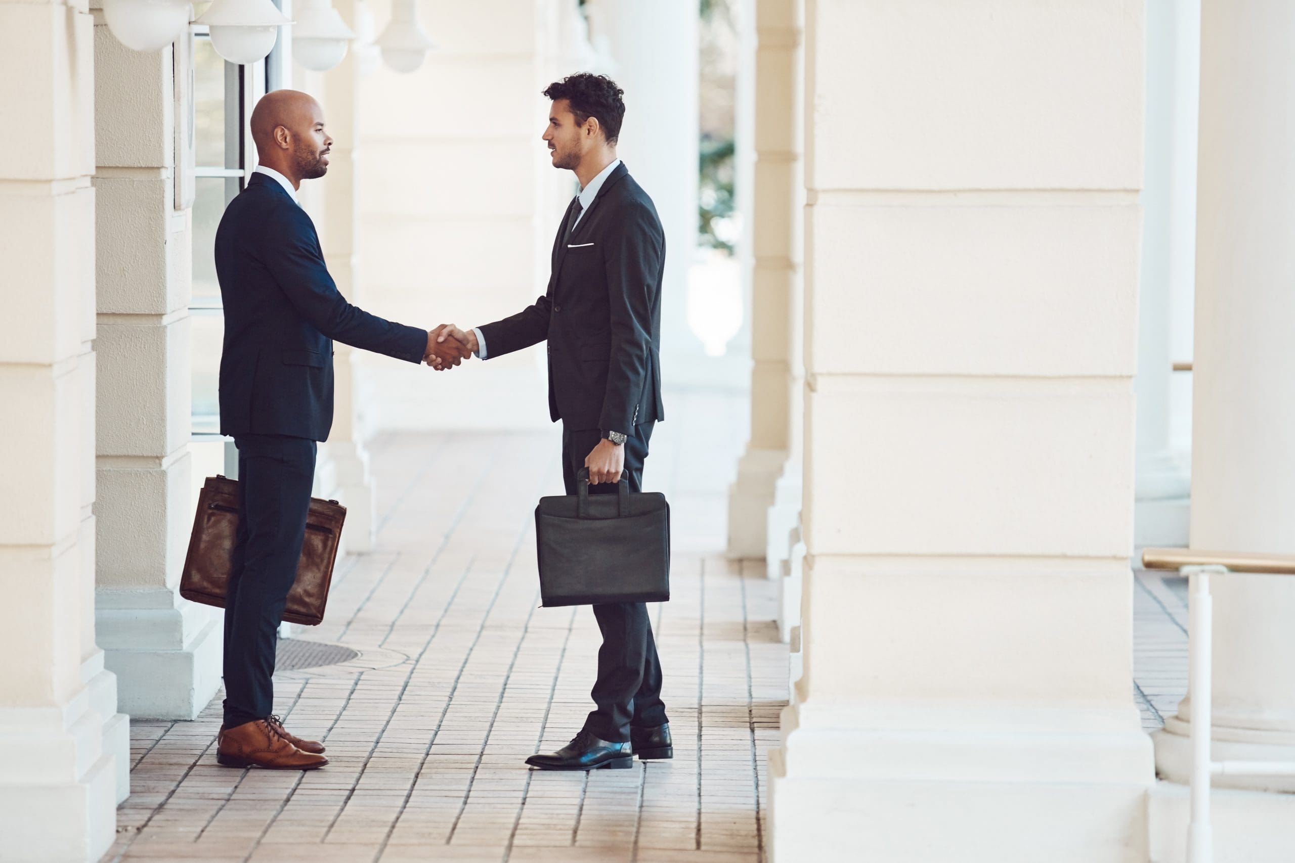 Two men shaking hands, business agreement