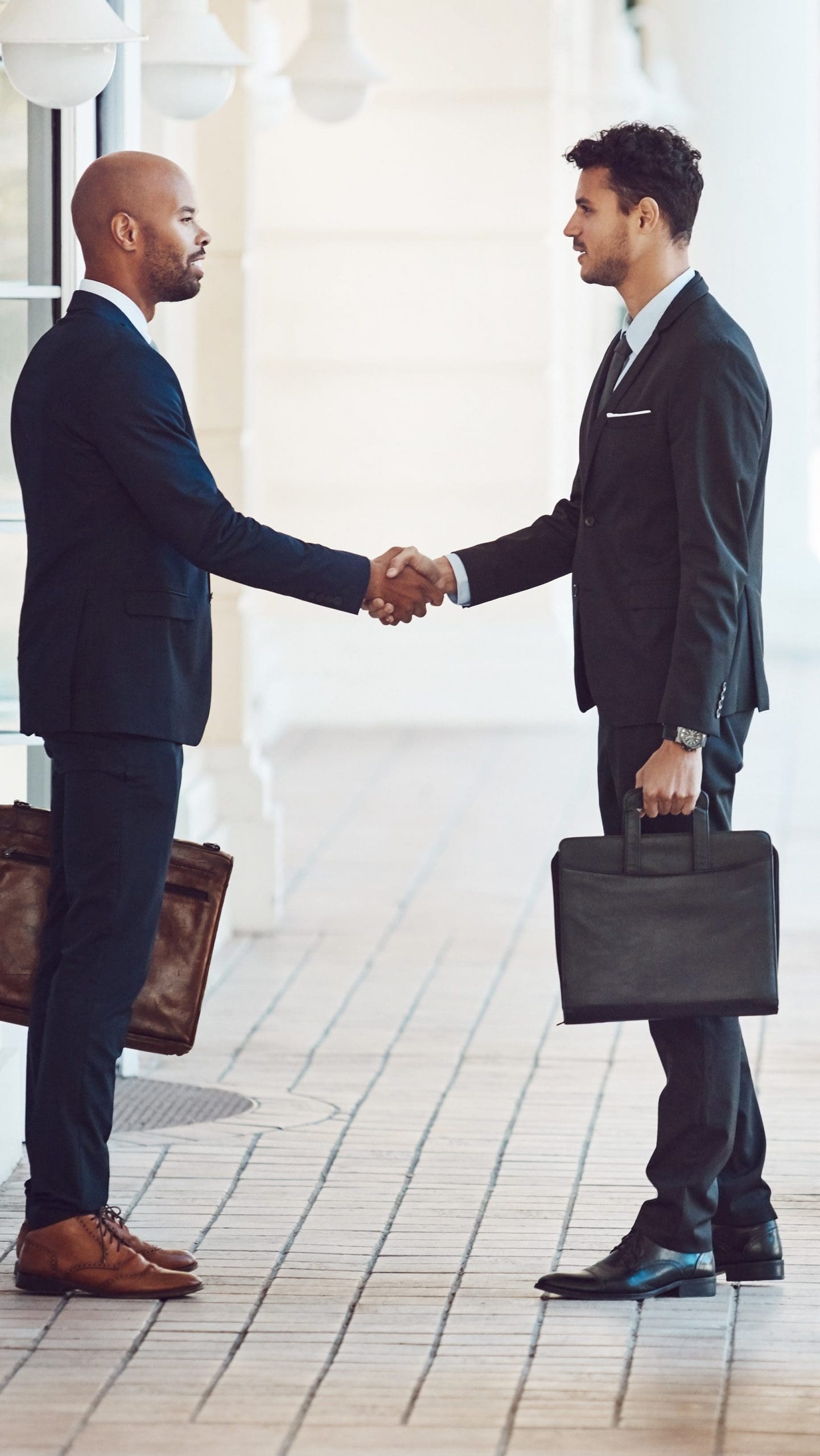 Two men shaking hands, business agreement